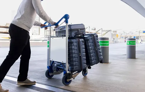 Hoe u de bagagekar op de luchthaven gebruikt